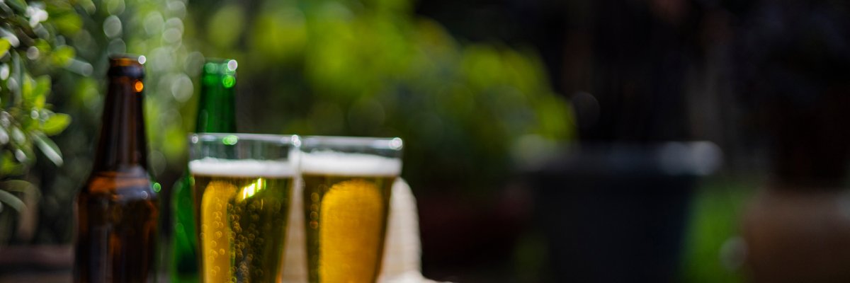 Pretzels And Beer Glasses On A Woven Hat Pretzels And Beer Glasses On A Woven Hat