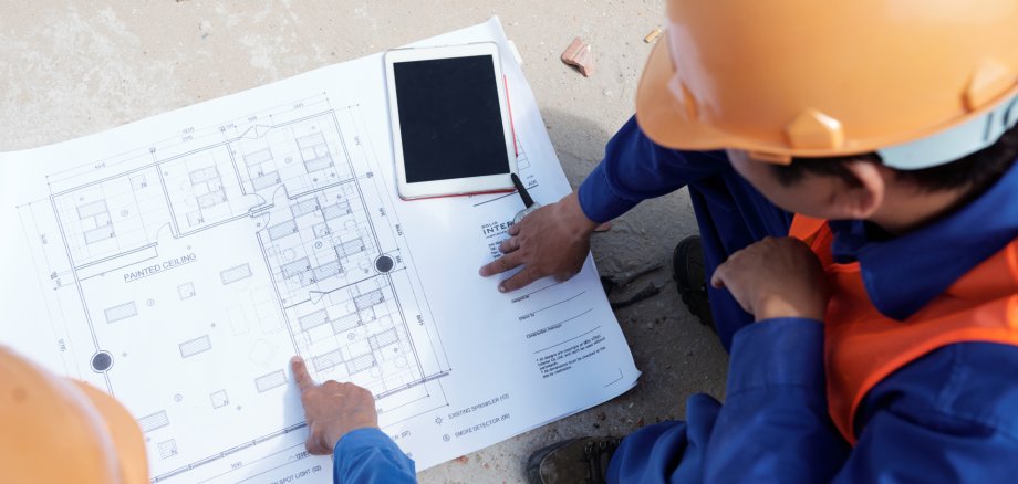 Working discussing building of house