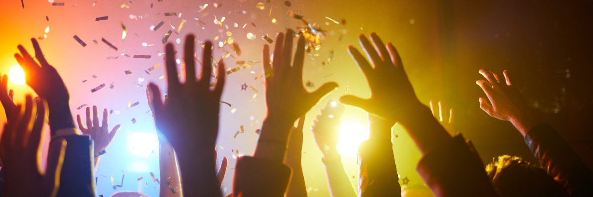 Raising hands up at musical performance