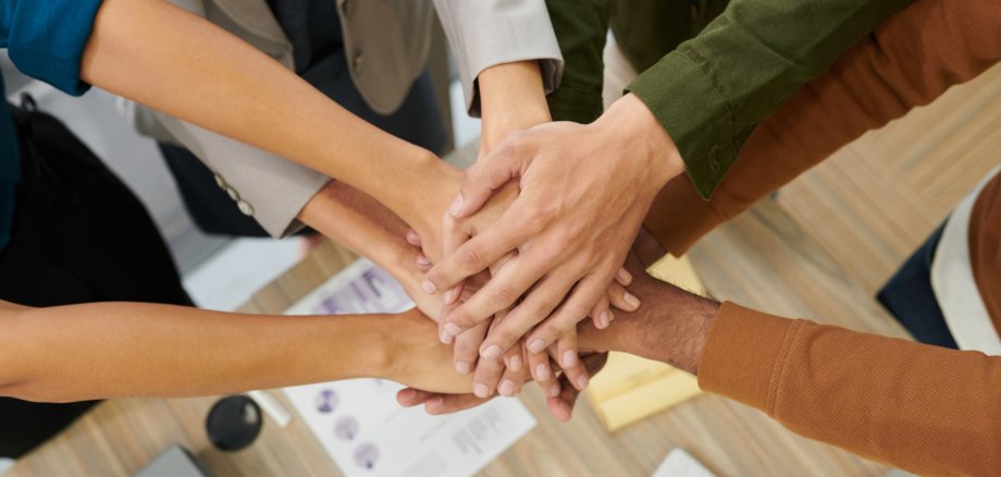 Business People Stacking Hands